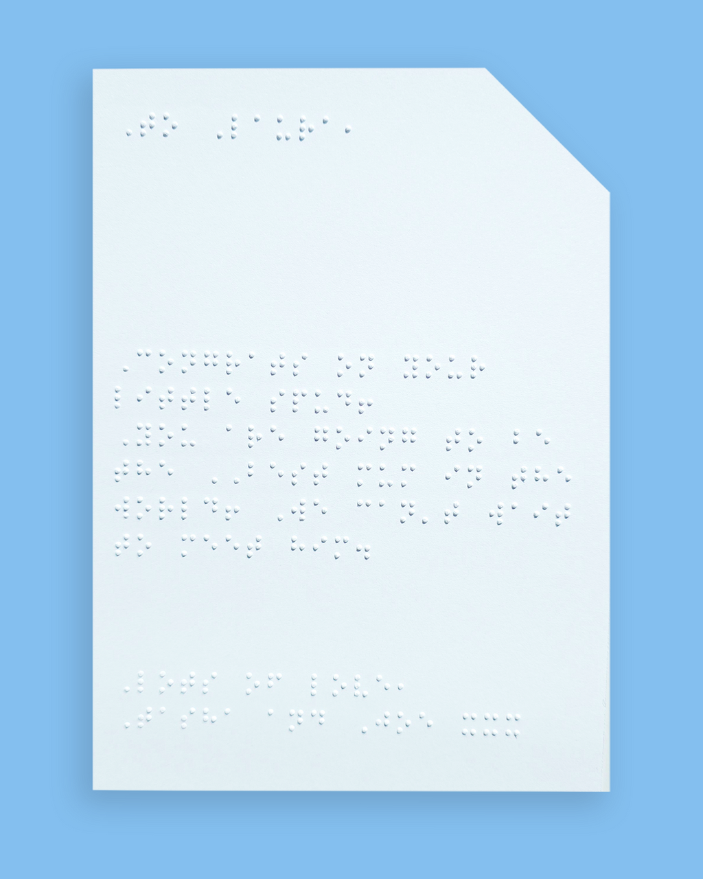 Pale blue background with an example of a braille message inside the card.
