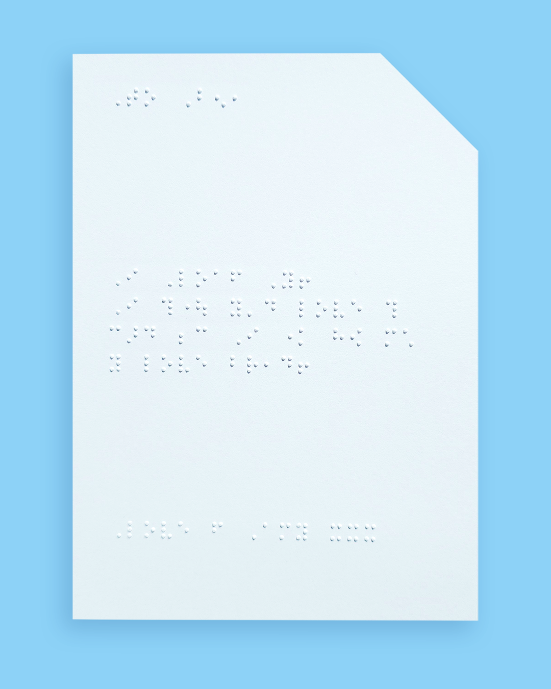 Pale blue background with an example of a braille message inside the card.