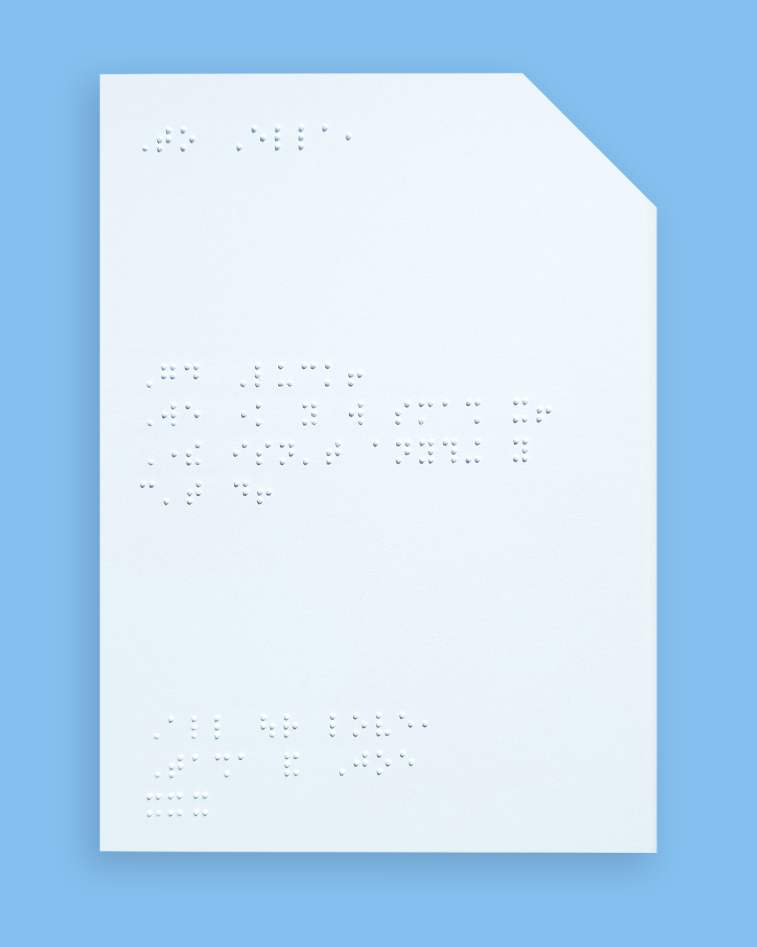 Pale blue background with an example of a braille message inside the card.