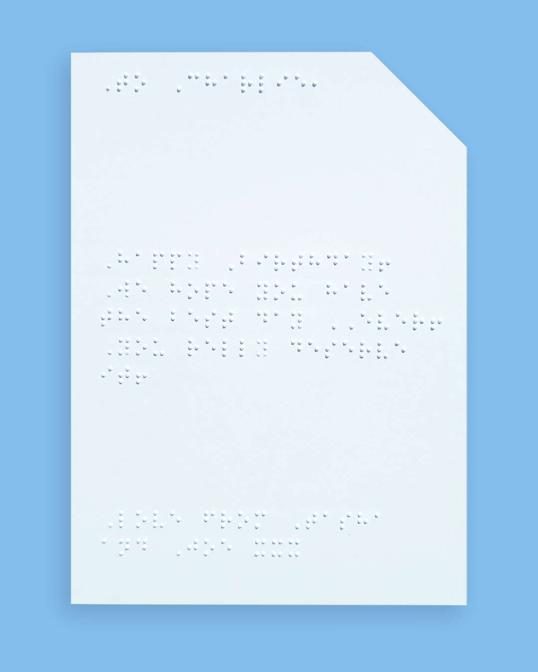 Pale blue background with an example of a braille message inside the card.