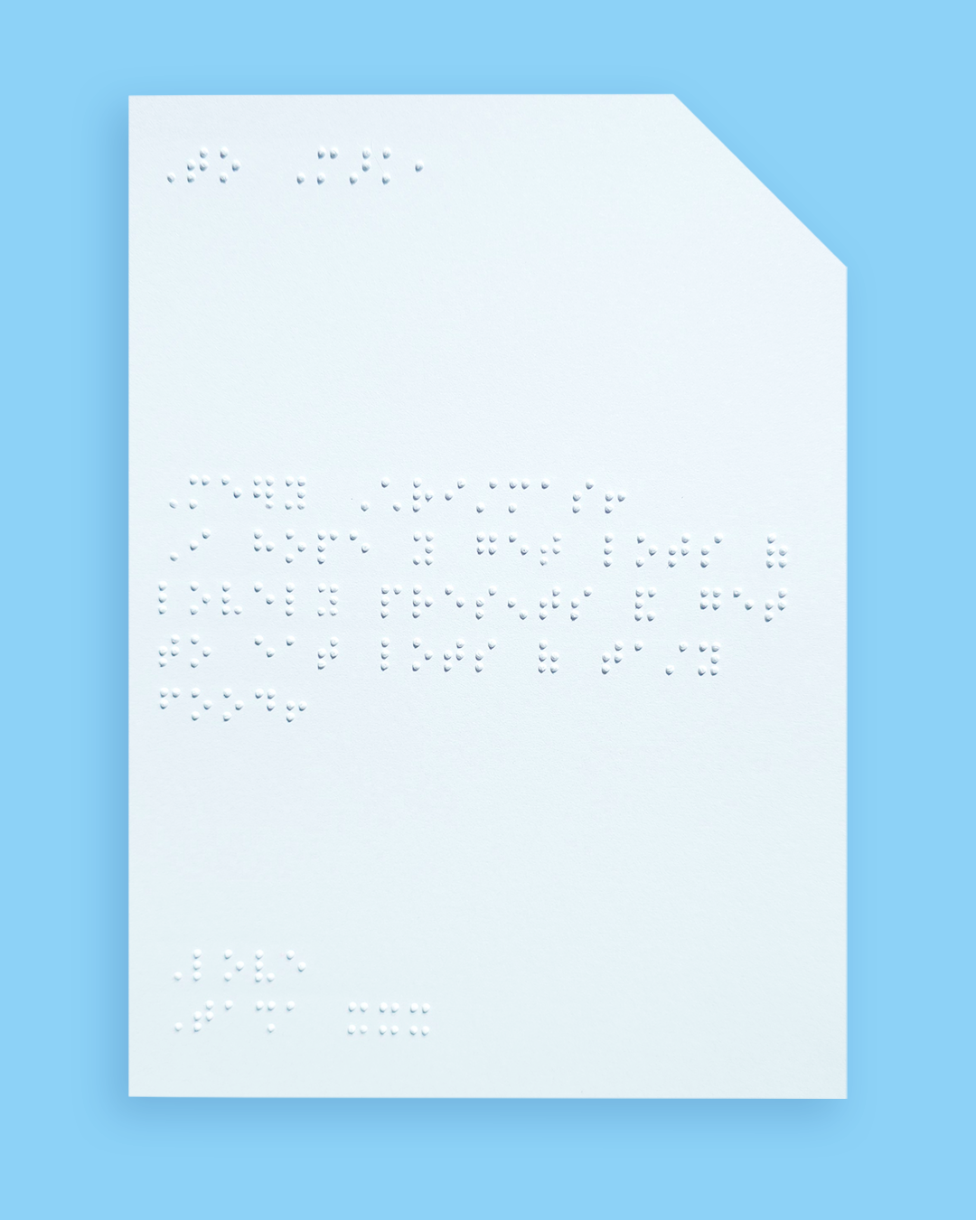 Pale blue background with an example of a braille message inside the card.